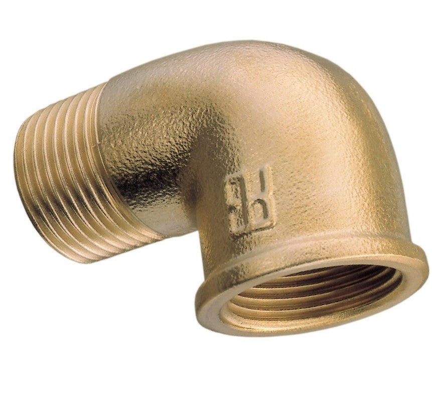 Brass pipe fitting on a white background
