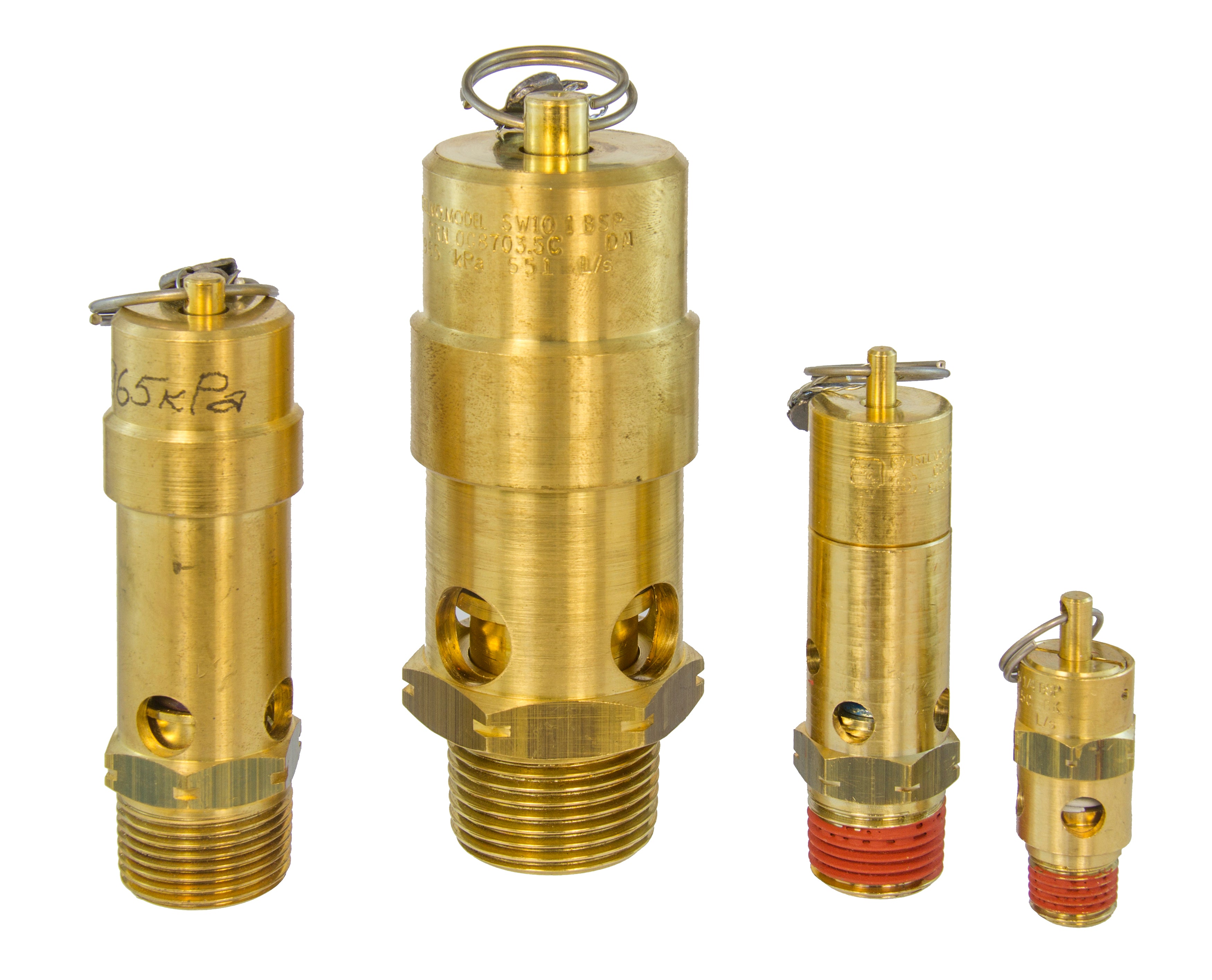 Set of brass mechanical components on a white background